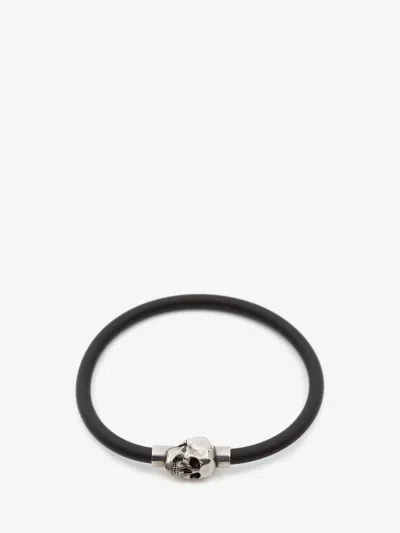 ALEXANDER MCQUEEN RUBBER CORD SKULL BRACELET