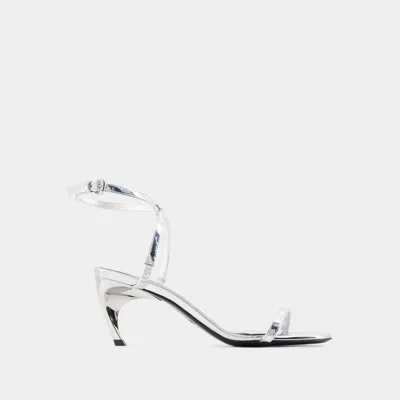 Alexander Mcqueen Seal Heeled Sandals In Gray