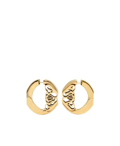 Alexander Mcqueen Seal-logo Cut-out Detailed Hoop Earrings In Yellow