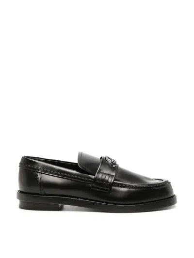 Alexander Mcqueen Seal Logo Plaque Loafers In Black
