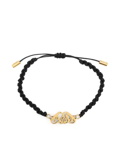 Alexander Mcqueen Seal-plaque Braided-strap Bracelet In Schwarz