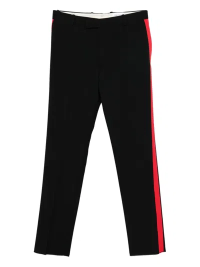 Alexander Mcqueen Side Stripe Trousers In Black