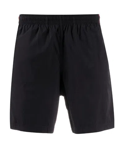 Alexander Mcqueen Side Tape Swim Shorts In Black