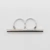 Alexander Mcqueen Cross-bar Ring In Palladium