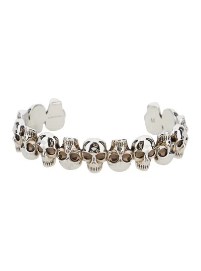 ALEXANDER MCQUEEN ALEXANDER MCQUEEN MEN SILVER-COLORED BRACELET WITH SKULL DESIGN AND INTERNAL ENGRAVED LOGO IN BRASS 