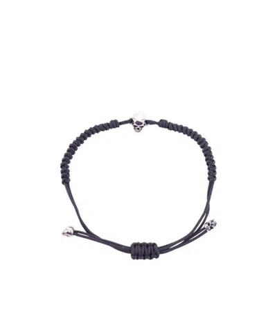 Alexander Mcqueen Skull-charm Cord Bracelet In Black