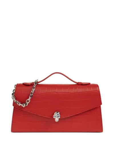 Alexander Mcqueen Skull Embellished Croc-effect Leather Clutch In Red