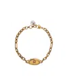Alexander Mcqueen Cuban Link Chain Bracelet With Skull Detail In Yellow
