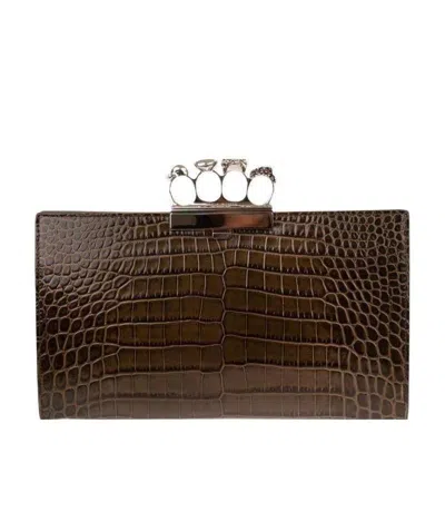 Alexander Mcqueen Skull Four Ring Clutch Bag In Brown