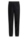 Alexander Mcqueen Patterned Trousers With Elastic Cuffs And Waistband In Black