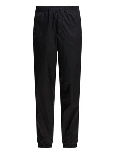 ALEXANDER MCQUEEN SKULL-JACQUARD TRACK PANTS