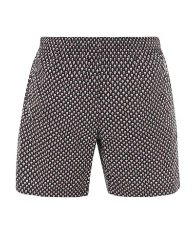 ALEXANDER MCQUEEN ALEXANDER MCQUEEN SPOTTED SKULL PRINT SWIM SHORTS