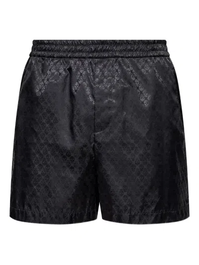 Alexander Mcqueen Skull-patterned Shorts In Black