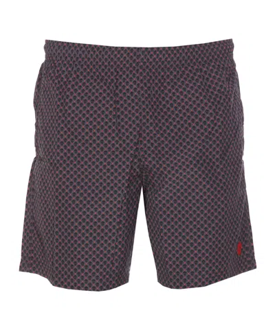 ALEXANDER MCQUEEN ALEXANDER MCQUEEN SPOTTED SKULL PRINT SWIM SHORTS