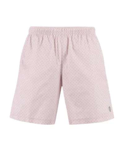 ALEXANDER MCQUEEN ALEXANDER MCQUEEN SPOTTED SKULL PRINT SWIM SHORTS