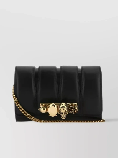 Alexander Mcqueen Skull Quilted Four Ring Clutch In Black