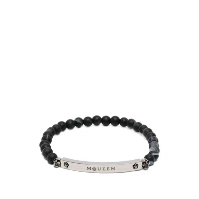 Alexander Mcqueen Skull-detail Beaded Bracelet In Pink