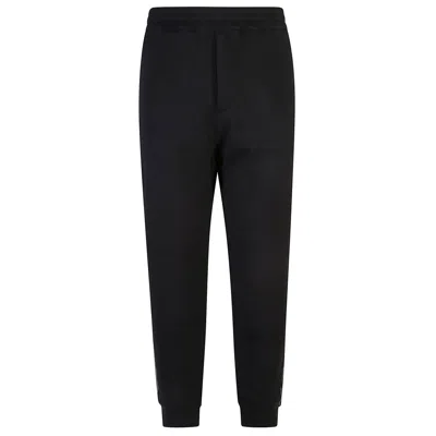 Alexander Mcqueen Pleat-front Trousers In Black