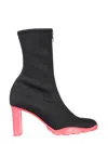 Alexander Mcqueen Slim Tread Boots With Enameled Leather Heel