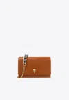 Alexander Mcqueen Small Skull-plaque Leather Crossbody Bag In Brown