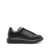 Alexander Mcqueen Black Sneakers With Logo Lettering On The Rear And Oversize Rubber Sole In Leather