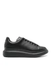Alexander Mcqueen Black Sneakers With Logo Lettering On The Rear And Oversize Rubber Sole In Leather In Black