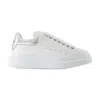 Alexander Mcqueen Chunky Sole Oversized Sneakers With Metallic Heel Tab