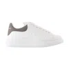 Alexander Mcqueen White Oversize Sneakers With Flat Laces And Contrasting Heel With Logo Lettering In Leather Man In Multi