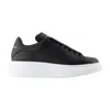 Alexander Mcqueen Black Low Top Sneakers With Logo Lettering On Tongue And Heel In Leather Woman In Black