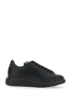 Alexander Mcqueen Black Sneakers With Logo Lettering On The Rear And Oversize Rubber Sole In Leather In Black