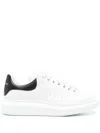Alexander Mcqueen White And Black Low-top Sneakers With Chunky Sole And Contrasting Heel Tab In Leather Man In White