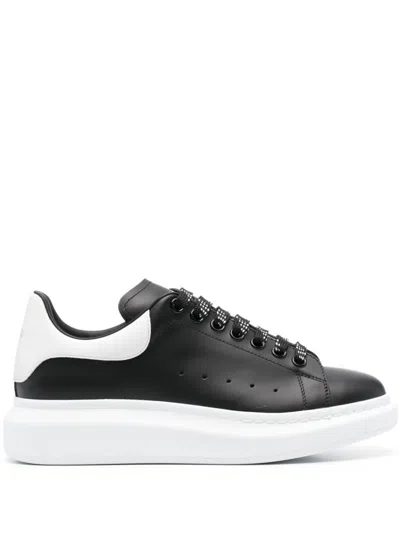 Alexander Mcqueen Black Low Top Sneakers With Logo Lettering On The Tongue In Leather Man