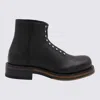 Alexander Mcqueen Chunky Sole Round Toe Studded Ankle Boots In Black