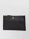 Alexander Mcqueen Skull Embossed Zipped Wallet In Black