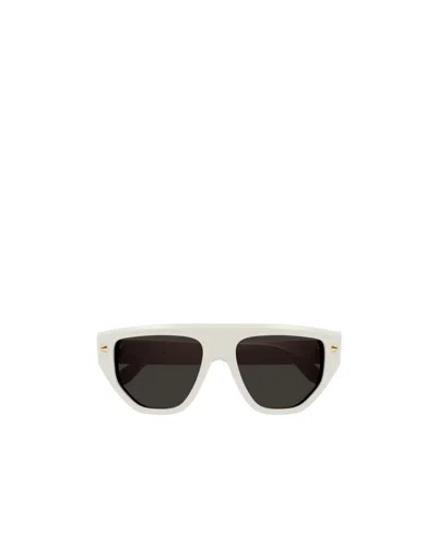Alexander Mcqueen Stud-detail Oval-frame Sunglasses In Black