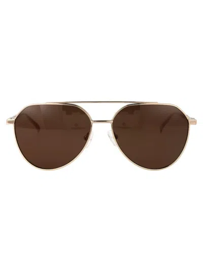 Alexander Mcqueen Sunglasses In Brown