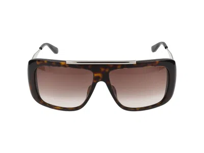 Alexander Mcqueen Sunglasses In Brown