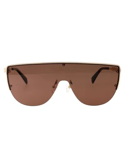 Alexander Mcqueen Am0457s Sunglasses In Gold