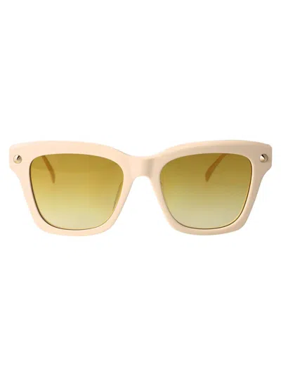Alexander Mcqueen Sunglasses In Ivory-gold-yellow
