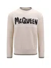 Alexander Mcqueen Graffiti Logo-intarsia Organic-cotton Sweater In Beige