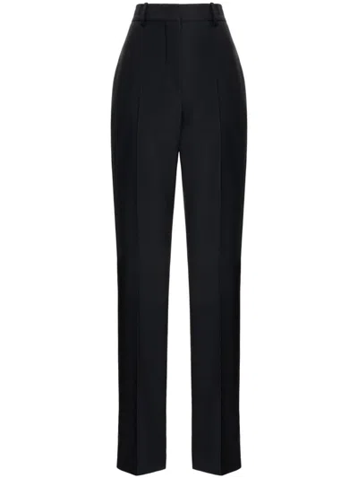 Alexander Mcqueen Tailored Wool Trousers In Black