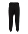 Alexander Mcqueen Pleat-front Trousers In Black