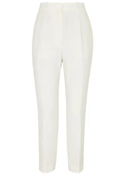 Alexander Mcqueen Tapered Slim-leg Trousers In Ivory