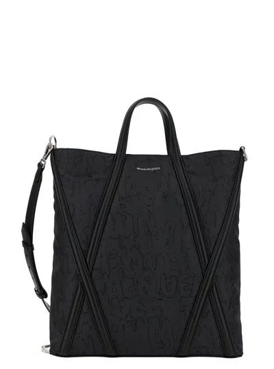 ALEXANDER MCQUEEN ALEXANDER MCQUEEN MEN 'THE HARNESS' BLACK TOTE BAG WITH LOGO DETAIL IN NYLON MAN