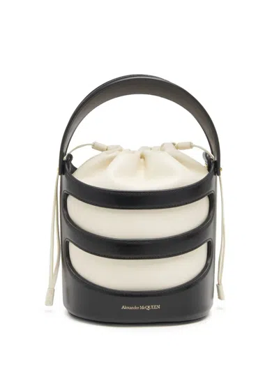 ALEXANDER MCQUEEN THE RISE BUCKET BAG IN BLACK AND SOFT IVORY