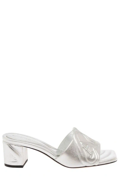 Alexander Mcqueen The Seal Emboosed Metallic Sandals In Silver