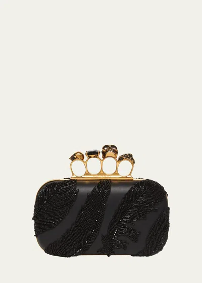 Alexander Mcqueen Four Ring Embellished Leather Clutch In Black