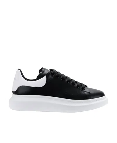 Alexander Mcqueen Black Low Top Sneakers With Logo Lettering On The Tongue In Leather Man
