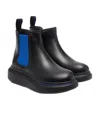 Alexander Mcqueen Thick-soled Jacketed Boots In Black