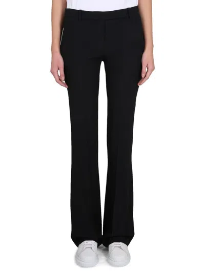 Alexander Mcqueen Tight Bootcut Trousers In Black